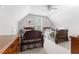 Bedroom with two twin beds, ceiling fan, neutral paint, and a large dresser at 2021 Terri Creek Dr, Fuquay Varina, NC 27526