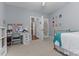 Bedroom featuring a gold metal bed frame and lots of natural light at 2021 Terri Creek Dr, Fuquay Varina, NC 27526