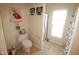Bright bathroom with a toilet and walk-in shower at 2500 Friedland Pl # 101, Raleigh, NC 27617