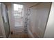 Bathroom featuring a tub and shower with a window at 2500 Friedland Pl # 101, Raleigh, NC 27617