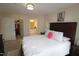 Comfortable bedroom with a large bed, bedside tables, and access to closet and bathroom at 2500 Friedland Pl # 101, Raleigh, NC 27617