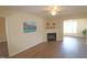 Inviting living room features a fireplace, hardwood floors, and an open layout, perfect for modern living at 2500 Friedland Pl # 101, Raleigh, NC 27617