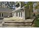 Inviting back deck features ample space, perfect for outdoor gatherings and enjoying the serene surroundings at 29 Mocking Ln, Rocky Mount, NC 27804