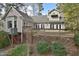 Lovely tan home featuring a spacious back deck, perfect for outdoor entertaining and relaxation at 29 Mocking Ln, Rocky Mount, NC 27804