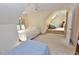 Bedroom suite with multiple beds, skylight, ceiling fan, and carpet at 29 Mocking Ln, Rocky Mount, NC 27804