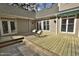 Back deck with patio furniture and access to the backyard at 29 Mocking Ln, Rocky Mount, NC 27804