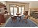 Dining room featuring wooden table and chairs with natural light from the sliding door at 29 Mocking Ln, Rocky Mount, NC 27804