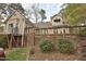 View of the home's exterior with wooden deck and well-kept landscaping at 29 Mocking Ln, Rocky Mount, NC 27804