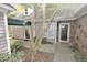 A covered walkway leads to a stone and siding home at 29 Mocking Ln, Rocky Mount, NC 27804