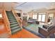 Open-concept living room with a fireplace and plenty of natural light at 29 Mocking Ln, Rocky Mount, NC 27804