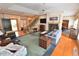 Inviting living room with a fireplace, hardwood floors, and natural light at 29 Mocking Ln, Rocky Mount, NC 27804