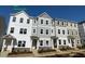 New construction townhome with multi-tone exterior and inviting entrance at 3007 Honeymyrtle Ln, Durham, NC 27703