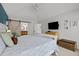 Bright bedroom features vaulted ceiling, ensuite access, and neutral decor at 3416 Cottonwood Dr, Durham, NC 27707