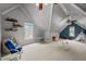 Finished bonus room with vaulted ceilings, neutral walls, and plenty of natural light at 3416 Cottonwood Dr, Durham, NC 27707