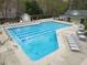 Sparkling community pool with lounge chairs and well-maintained facilities at 3416 Cottonwood Dr, Durham, NC 27707