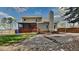 Backyard featuring a screened porch, a wood deck, and a gravel walkway at 3501 Kensett Way, Raleigh, NC 27616