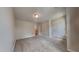 Bedroom displaying neutral walls and carpet, a ceiling light fixture, and white doors at 3501 Kensett Way, Raleigh, NC 27616
