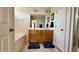Bathroom features a double vanity, soaking tub, and neutral color palette at 404 Braxman Ln, Holly Springs, NC 27540