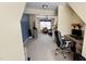 Upstairs bonus room perfect for home office, featuring natural light and a comfortable seating area at 404 Braxman Ln, Holly Springs, NC 27540