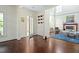 Spacious living room with fireplace, hardwood floors, and plenty of natural light at 407A Hillsborough St, Chapel Hill, NC 27514