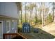 Backyard view with a storage shed, a playhouse, and ample space for Gathering fun at 410 N Currie Dr, Sanford, NC 27330