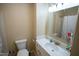 This bathroom features a tub with shower, toilet, and vanity with sink at 410 N Currie Dr, Sanford, NC 27330