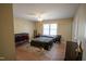 Bedroom featuring a double bed, crib, and lots of natural light at 410 N Currie Dr, Sanford, NC 27330