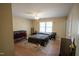 Bedroom featuring a double bed, crib, and lots of natural light at 410 N Currie Dr, Sanford, NC 27330