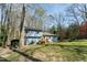 Two-story home with mature trees at 410 N Currie Dr, Sanford, NC 27330