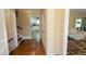 Hardwood hallway leading to the kitchen and living room at 410 N Currie Dr, Sanford, NC 27330
