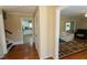 Hardwood hallway leading to the kitchen and living room at 410 N Currie Dr, Sanford, NC 27330