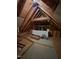 Spacious unfinished attic offering potential for storage or future living space; a versatile area to customize at 4116 Tall Pine Dr, Franklinton, NC 27525