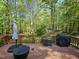 Large backyard deck offers lots of space for grilling and chilling, with a view to the woods beyond at 4116 Tall Pine Dr, Franklinton, NC 27525