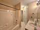 Neutral bathroom features shower-tub combination and single sink vanity at 4116 Tall Pine Dr, Franklinton, NC 27525