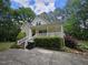 Charming one-story home with a covered porch, driveway, and landscaped front yard at 4116 Tall Pine Dr, Franklinton, NC 27525