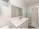 The bathroom offers a bright vanity and a glass-enclosed shower at 412 Winterlocken Dr, Sanford, NC 27330