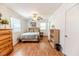 Bedroom with hardwood floors, bed, and natural light at 412 Winterlocken Dr, Sanford, NC 27330