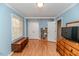 Bedroom featuring light blue walls, hardwood floors, and natural light at 412 Winterlocken Dr, Sanford, NC 27330