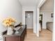 Inviting hallway with stylish décor and a glimpse into the living room at 412 Winterlocken Dr, Sanford, NC 27330