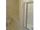 Bright bathroom featuring tub, walk-in shower, and toilet at 4425 Moss Garden Path, Raleigh, NC 27616