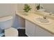 Bathroom features toilet, mirror, vanity with countertop sink, and plant at 4425 Moss Garden Path, Raleigh, NC 27616