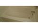 Clean white soaking tub and faucet at 4425 Moss Garden Path, Raleigh, NC 27616