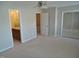 Bedroom features a ceiling fan, large closet and attached bathroom at 4425 Moss Garden Path, Raleigh, NC 27616