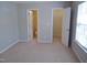 Spacious main bedroom includes en suite bathroom and walk-in closet at 4425 Moss Garden Path, Raleigh, NC 27616
