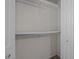 Walk-in closet with ample shelving and storage space at 4447 Antique Ln, Raleigh, NC 27616
