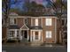 Townhome with a classic exterior, front porch, and a welcoming entrance at 4447 Antique Ln, Raleigh, NC 27616