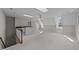 An upstairs bonus room with dormer windows, a ceiling fan, carpeted floors, and a kitchenette at 5122 Berkeley St, Raleigh, NC 27612