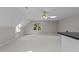 An upstairs bonus room with dormer windows, a ceiling fan, and carpeted floors at 5122 Berkeley St, Raleigh, NC 27612