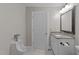 Modern half-bathroom featuring granite countertop and a water closet at 5122 Berkeley St, Raleigh, NC 27612