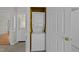 Laundry closet with stacked washer and dryer units at 5122 Berkeley St, Raleigh, NC 27612